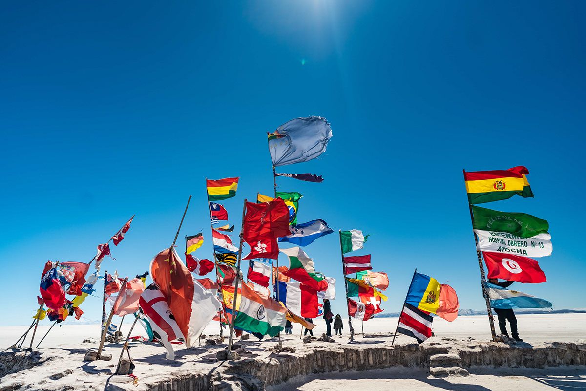Flags from around the world at the Dakar monument on the Salar de Uyuni, Bolivia